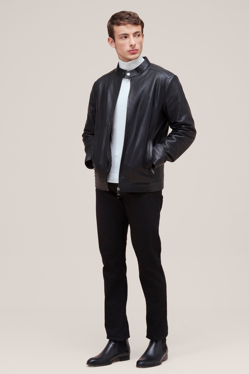 Lamb leather bomber with slim fit, zip features, and quilted lining for versatile style.