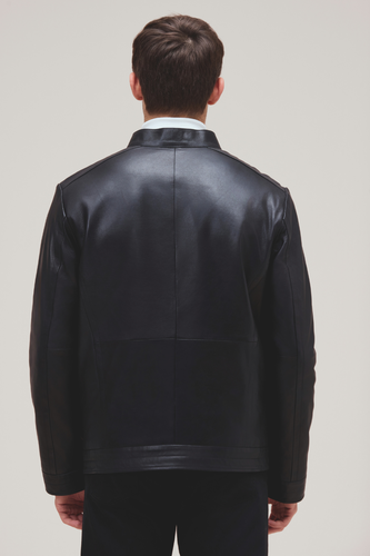Lamb leather bomber with slim fit, zip features, and quilted lining for versatile style.