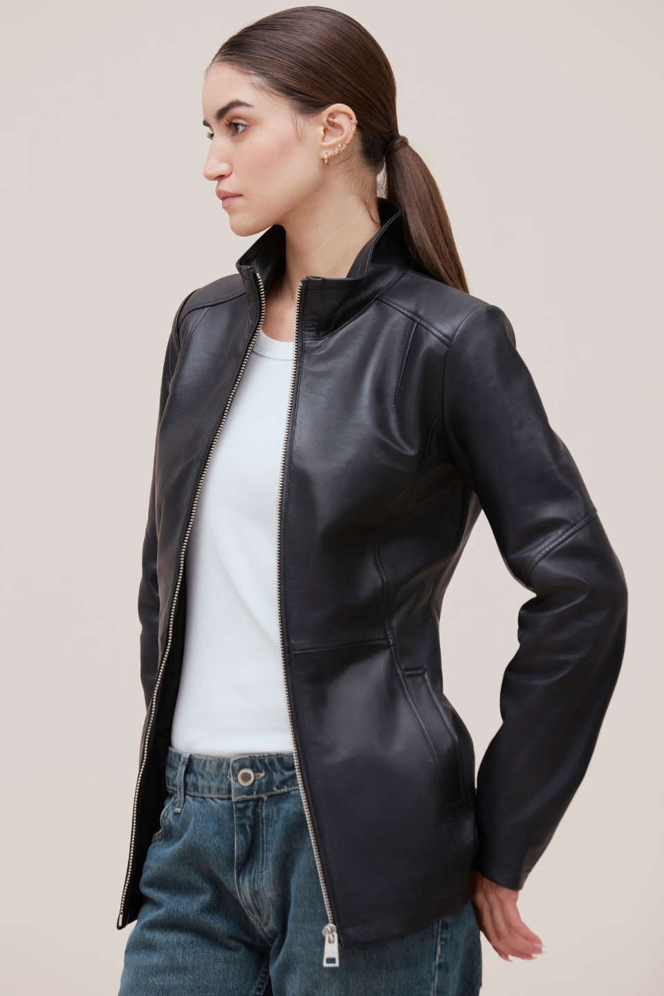 Carolyn Soft lamb leather with funnel neck and tonal zips.