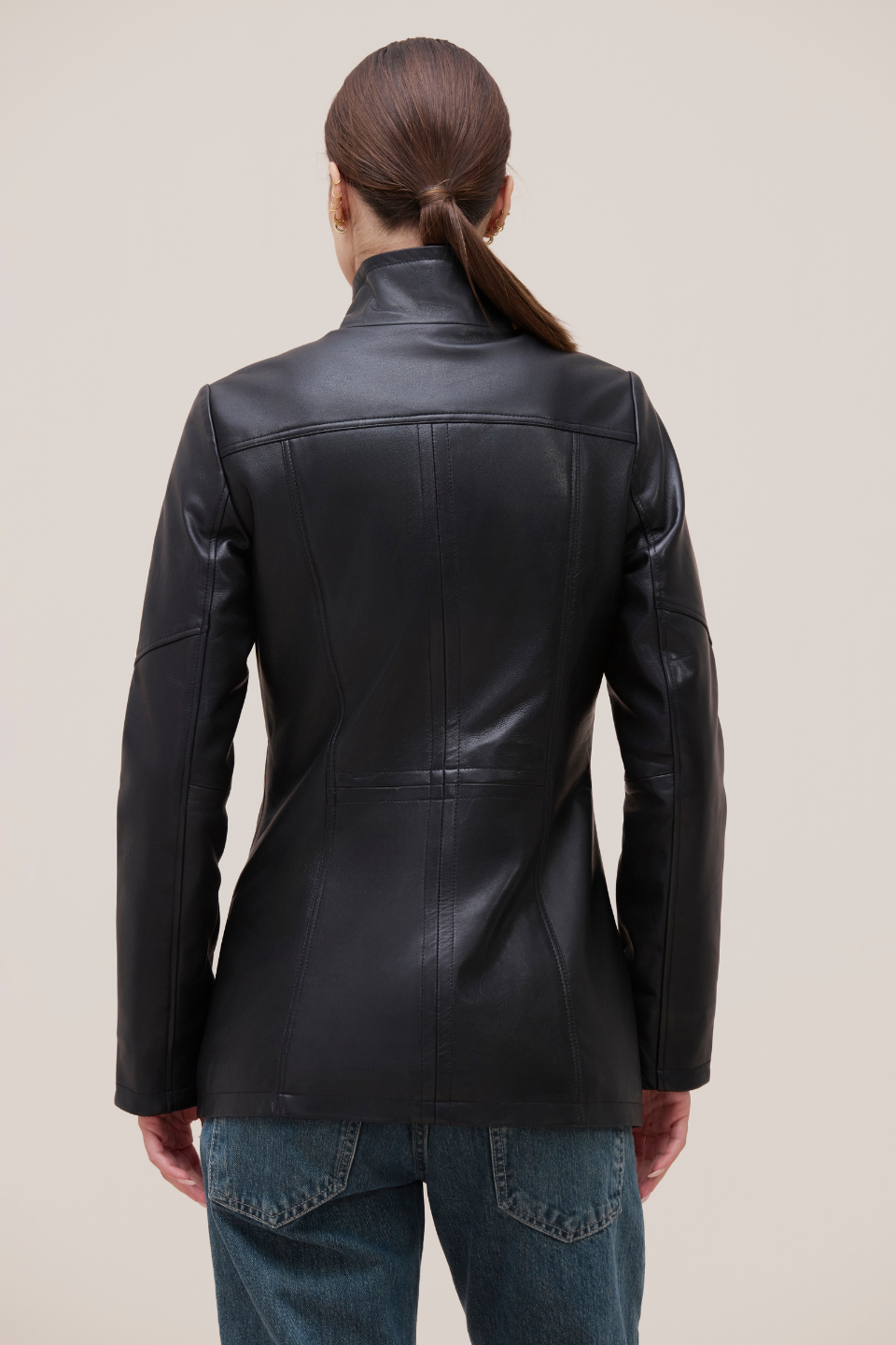 Carolyn Soft lamb leather with funnel neck and tonal zips.