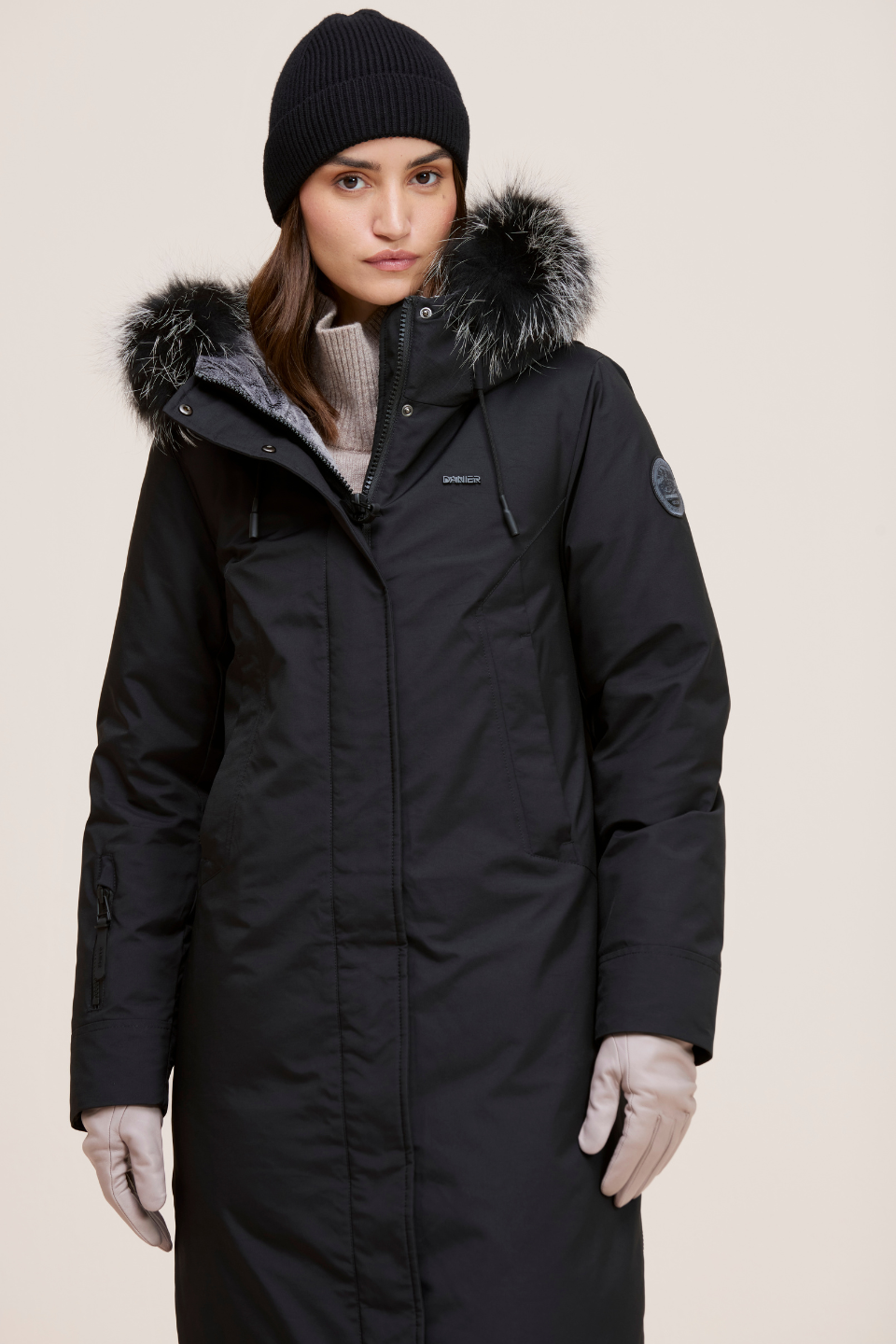Stacie Ultra-warm down puffer with utility pockets and smart winter features.