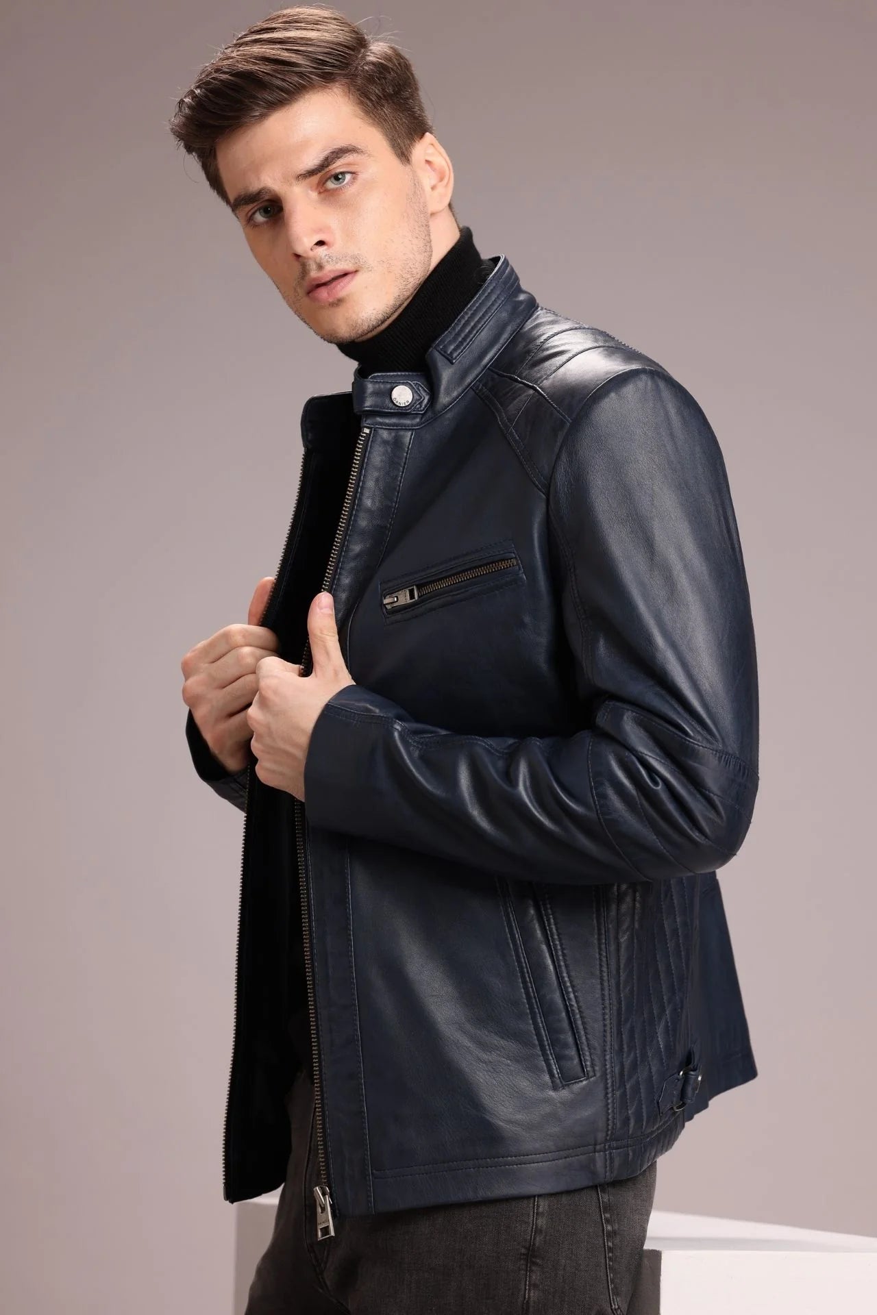 Slim-fit racer jacket with classic padding and zippered pockets for a sharp look.